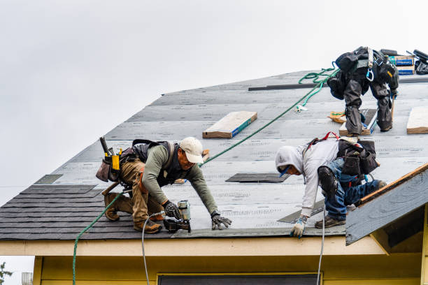Professional Roofing technician working in Marina, CA